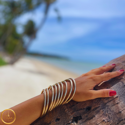 9 joncs bouddhistes or rose portés ensemble selon la tradition thaïlandaise - Bracelets Kumlai authentique avec mantra sacré